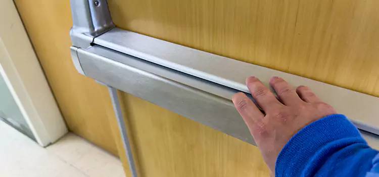 Installing a Push Bar on a Door Americus